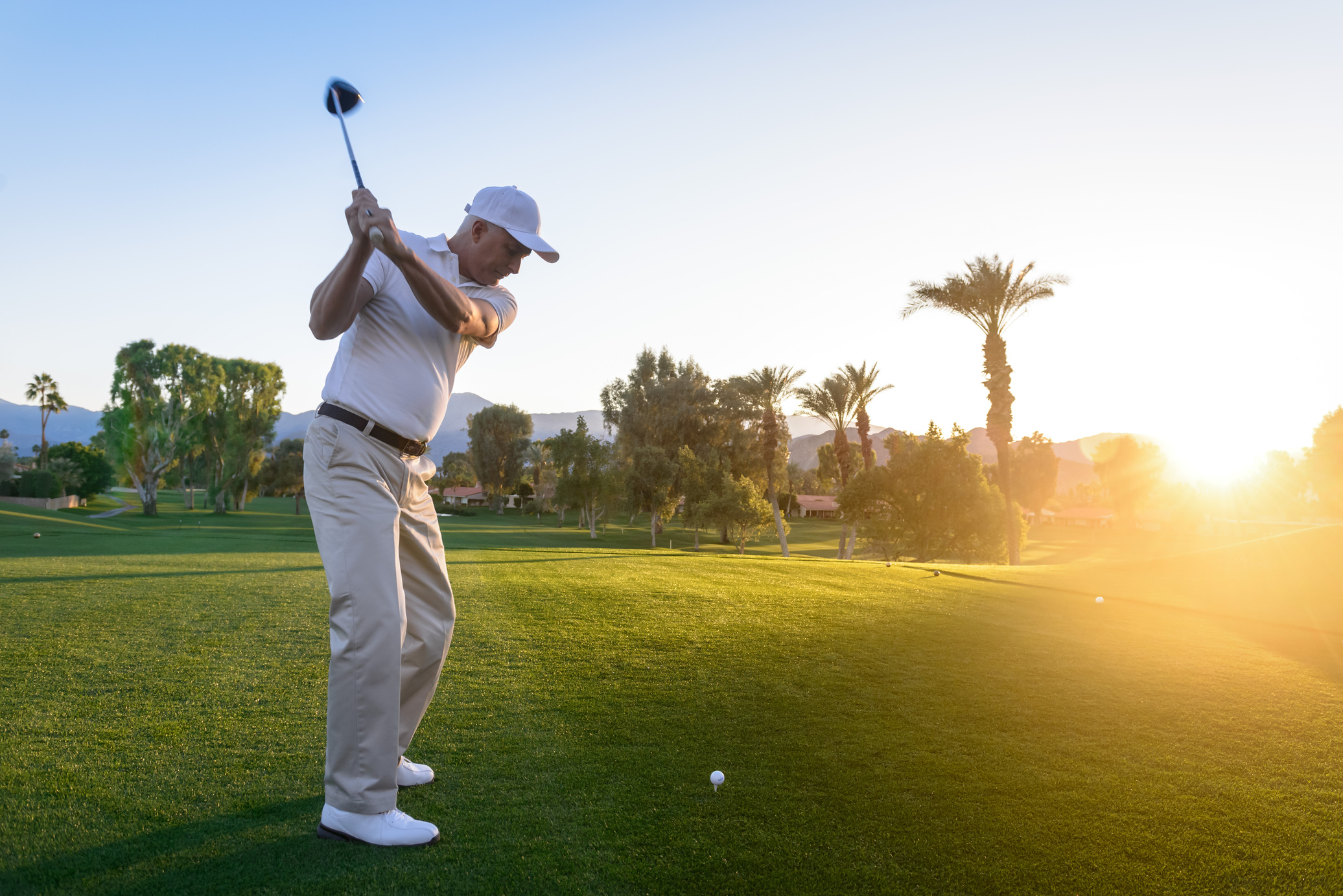 Golfer Hitting a Golf Ball